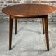 Scandinavian round teak table with integrated extension 70'S