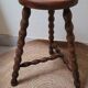 Tripod stool with turned legs