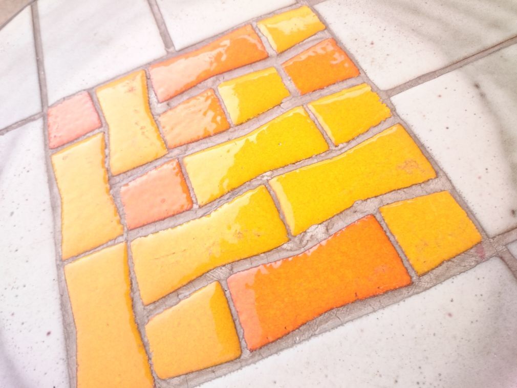 Round ceramic and steel coffee table