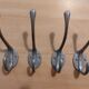 4 old aluminum hooks 30s