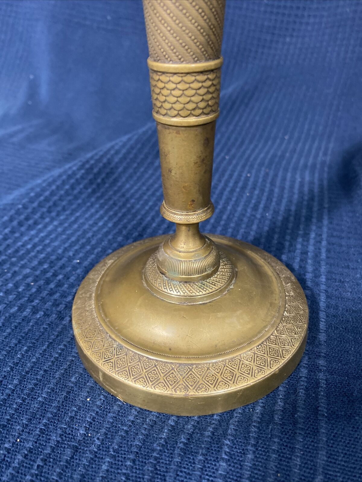 Old Louis-style brass candlestick