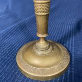 Old Louis-style brass candlestick
