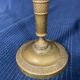 Old Louis-style brass candlestick