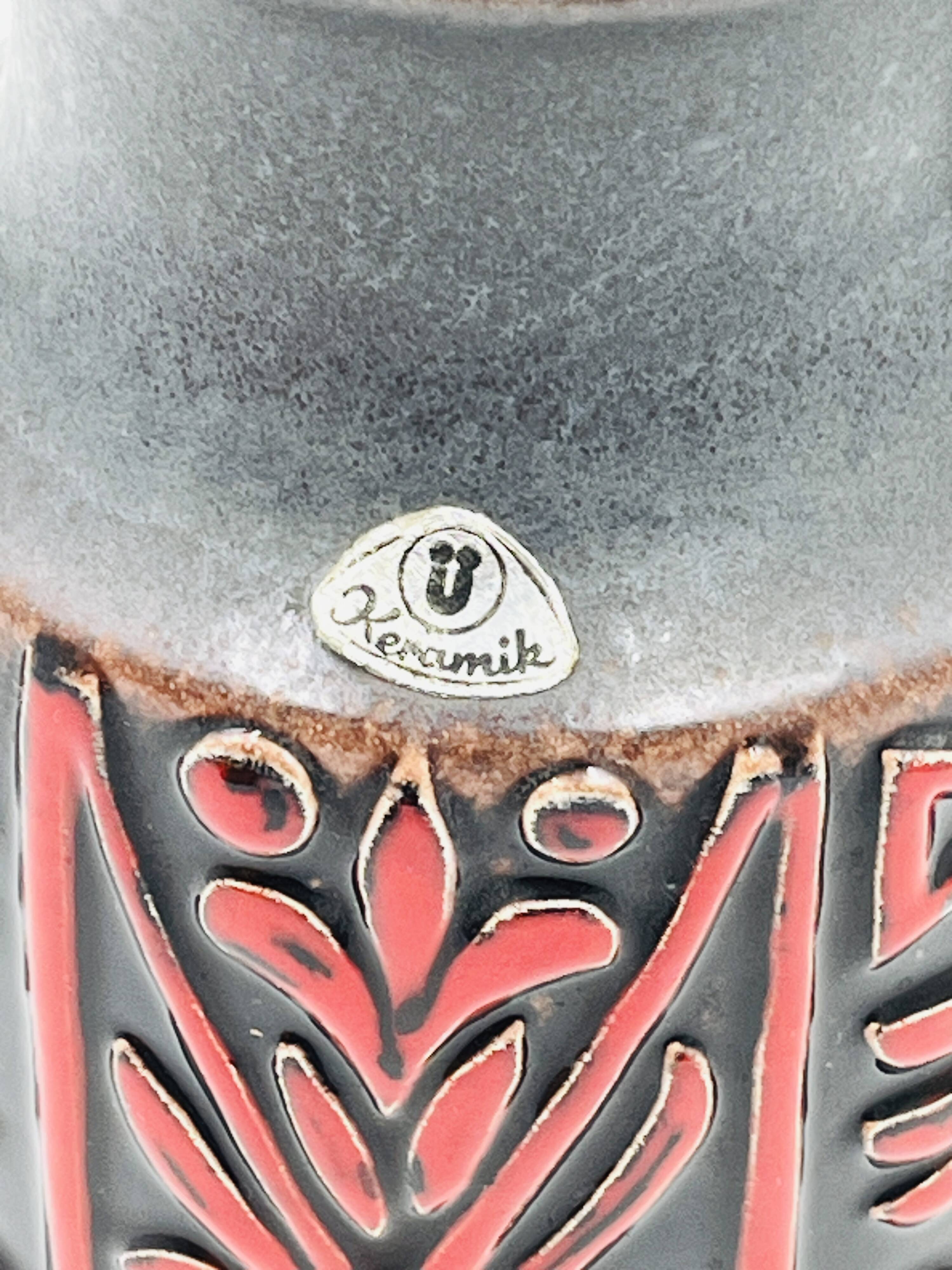 Vase West Germany, ceramic relief, red, 1970s.