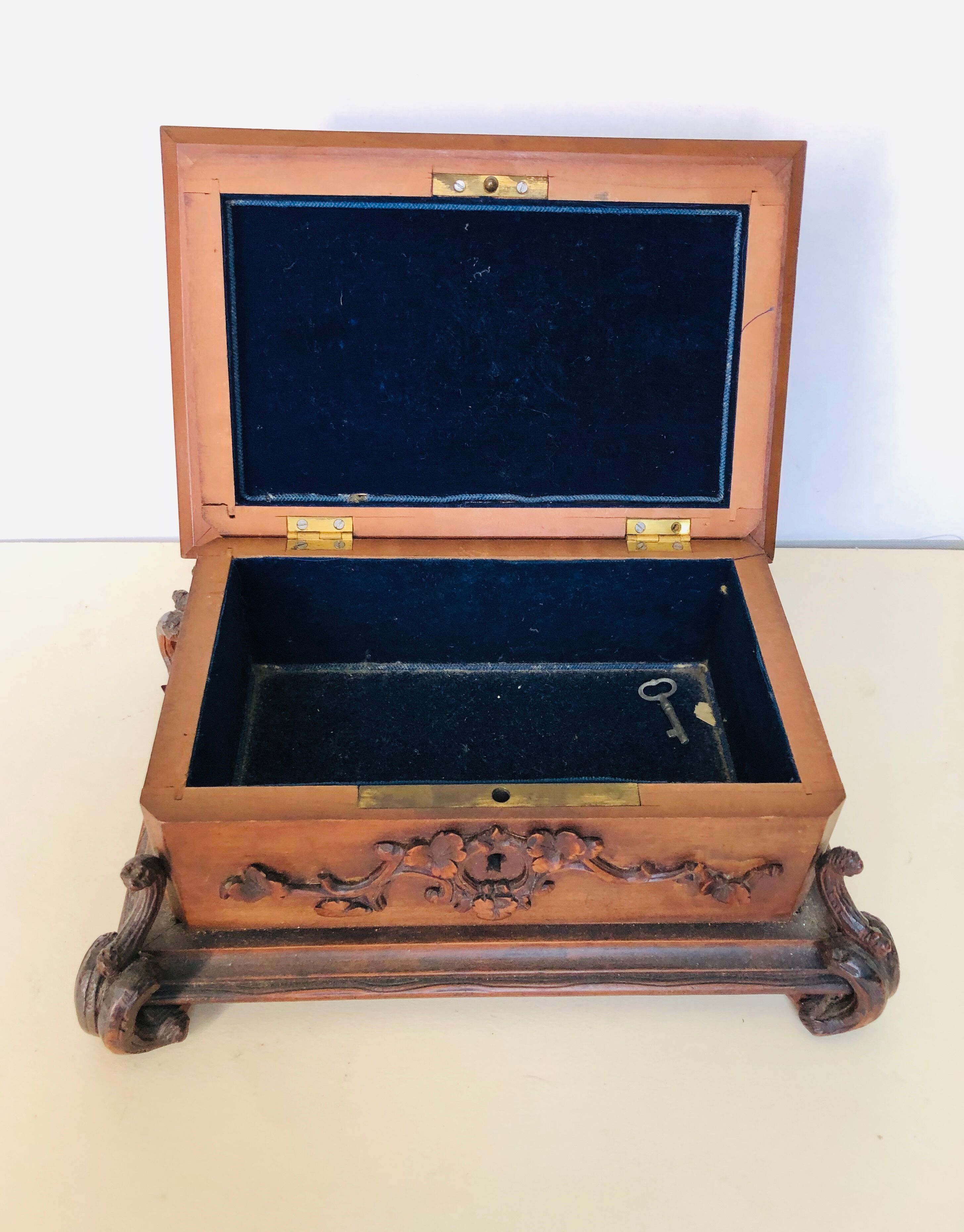Ancient carved wooden box