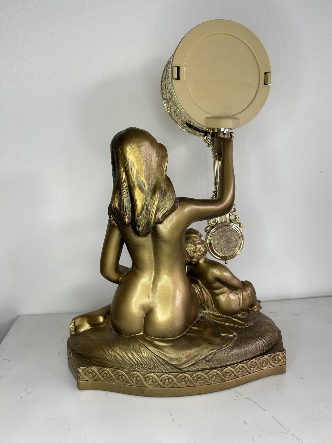 Vintage antique woman pendulum