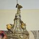 Golden metal birdcage – decorative work from the 20th century