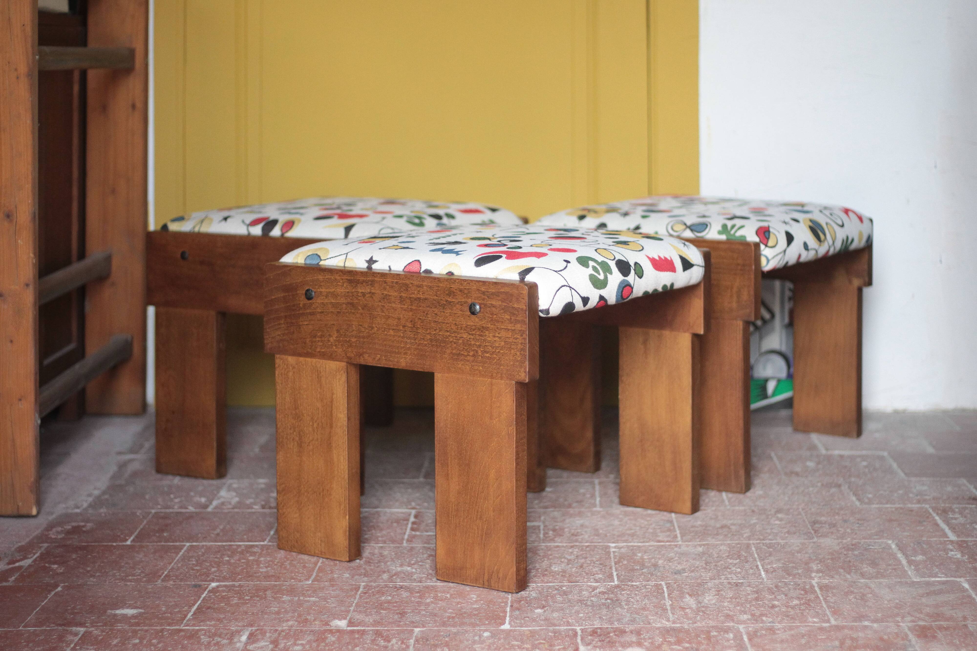 Set of 3 beech wood stools with fabric upholstery in the style of Miro.
