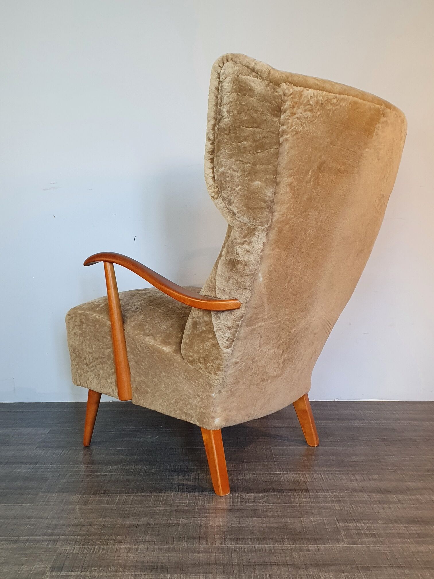 Norwegian sheepskin wing armchair with ottoman 1950