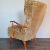 Norwegian sheepskin wing armchair with ottoman 1950