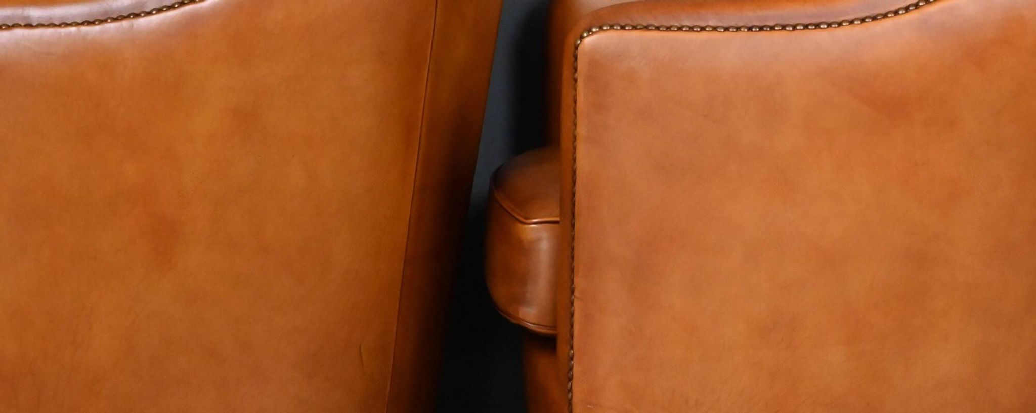 Pair of Solange club armchairs in sheepskin leather – reproduction