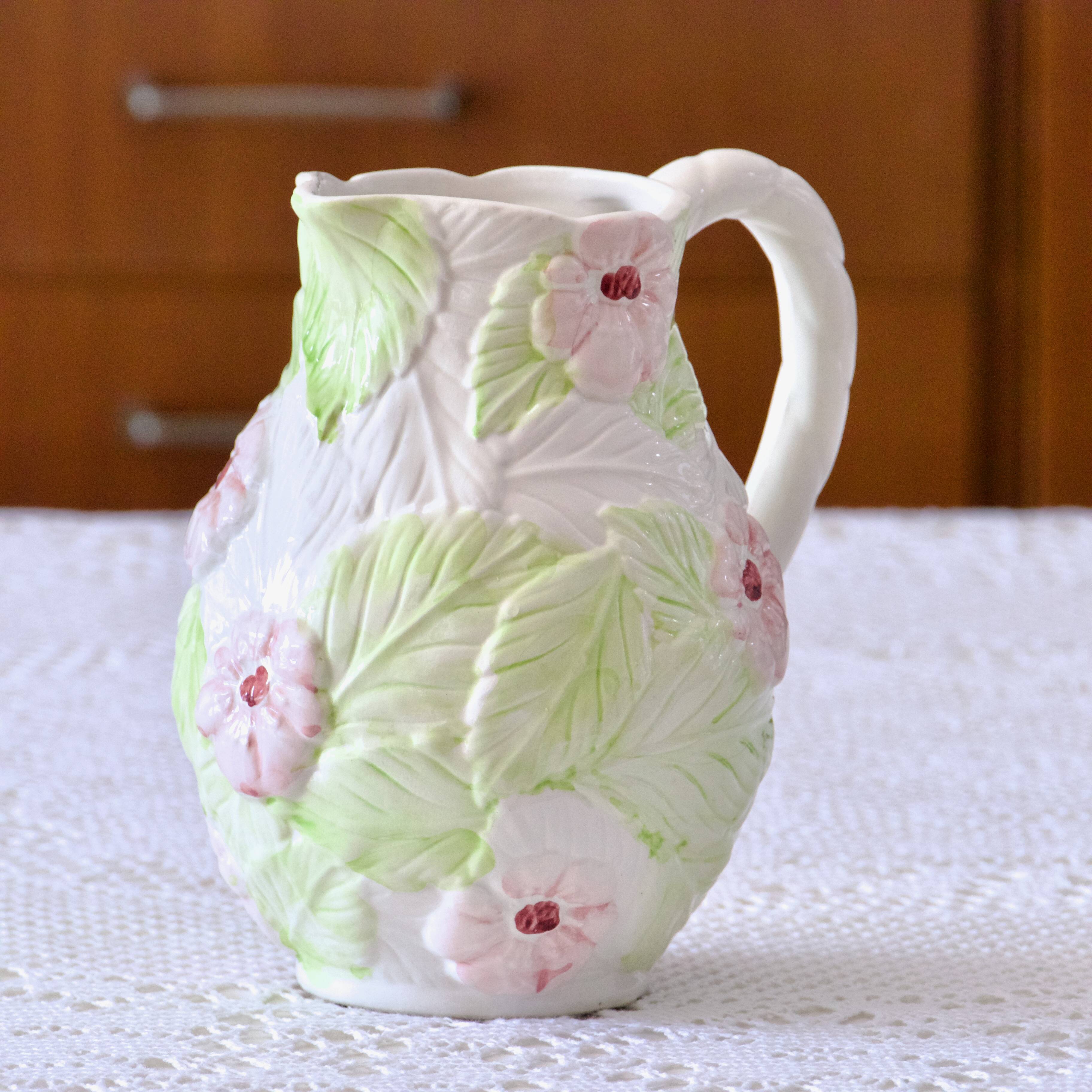 Hand-painted floral slip carafe