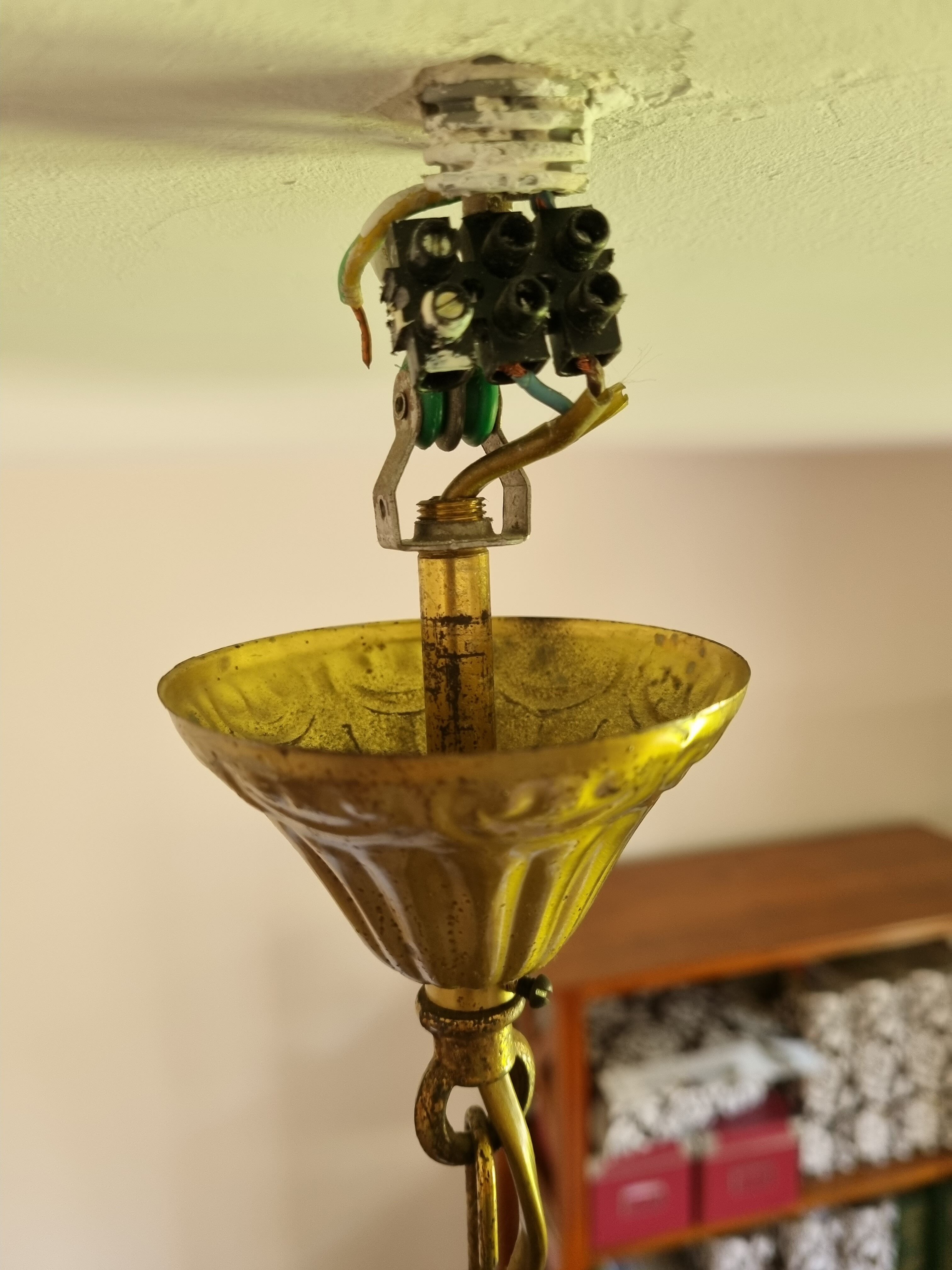 Brass chandelier and grapevine glass