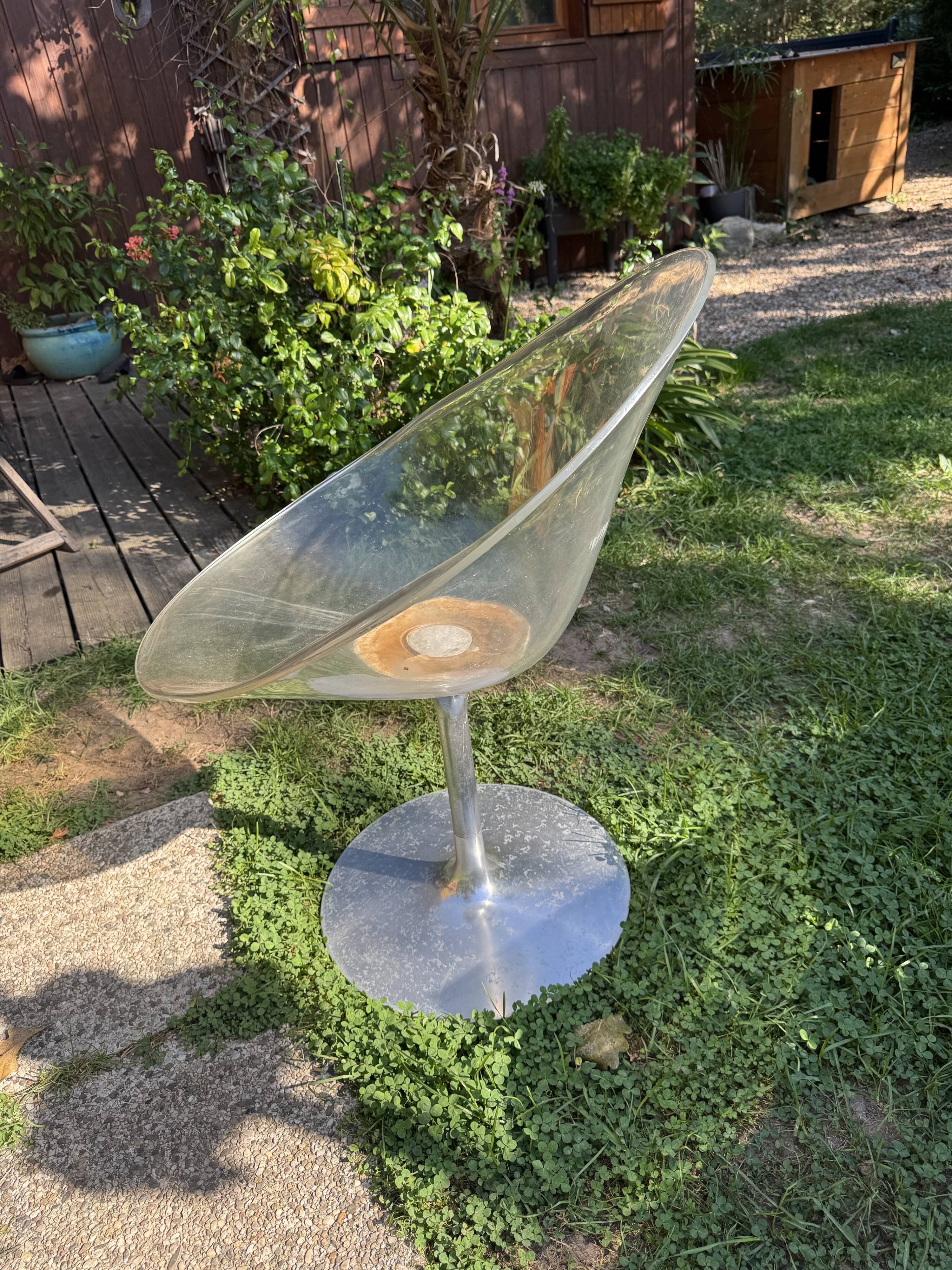 Transparent swivel armchair "Eros" by Philippe Starck for Kartell