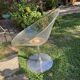 Transparent swivel armchair "Eros" by Philippe Starck for Kartell