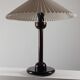 Vintage table in postmodern Art Deco revival with pleated lampshade.