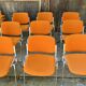 Sérié 39 chaises 4 fauteuils DSC 106 en tissu orange par Giancarlo Piretti pour Castelli