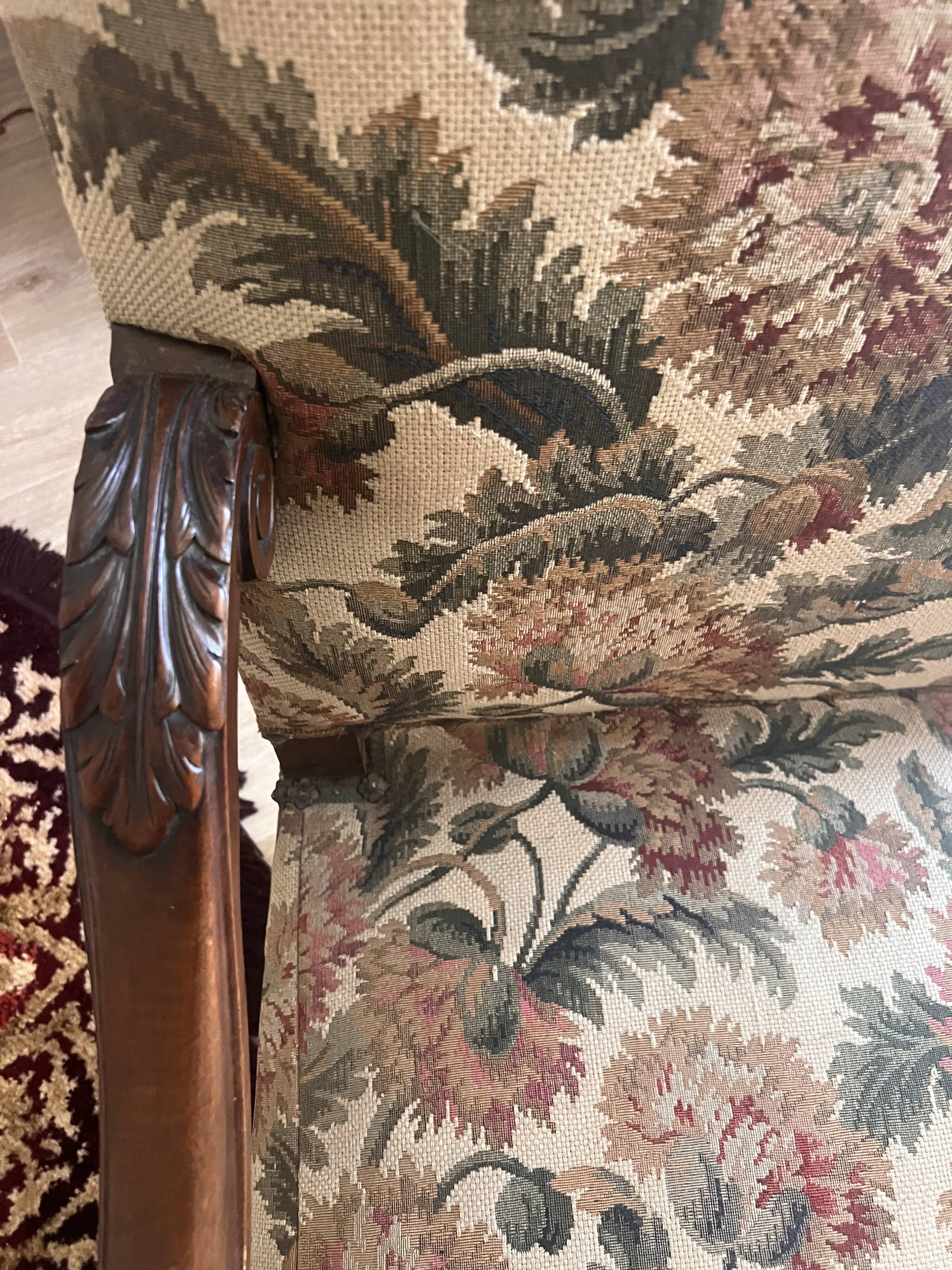 Antique armchair in Henri II style with masks