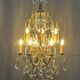Rococo-style chandelier with 9 light arms.