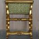 Folding stool with X-frame, carved golden wood, 19th century.