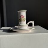 Small vintage hand-held candlestick in earthenware with green trim and floral decoration H10.5