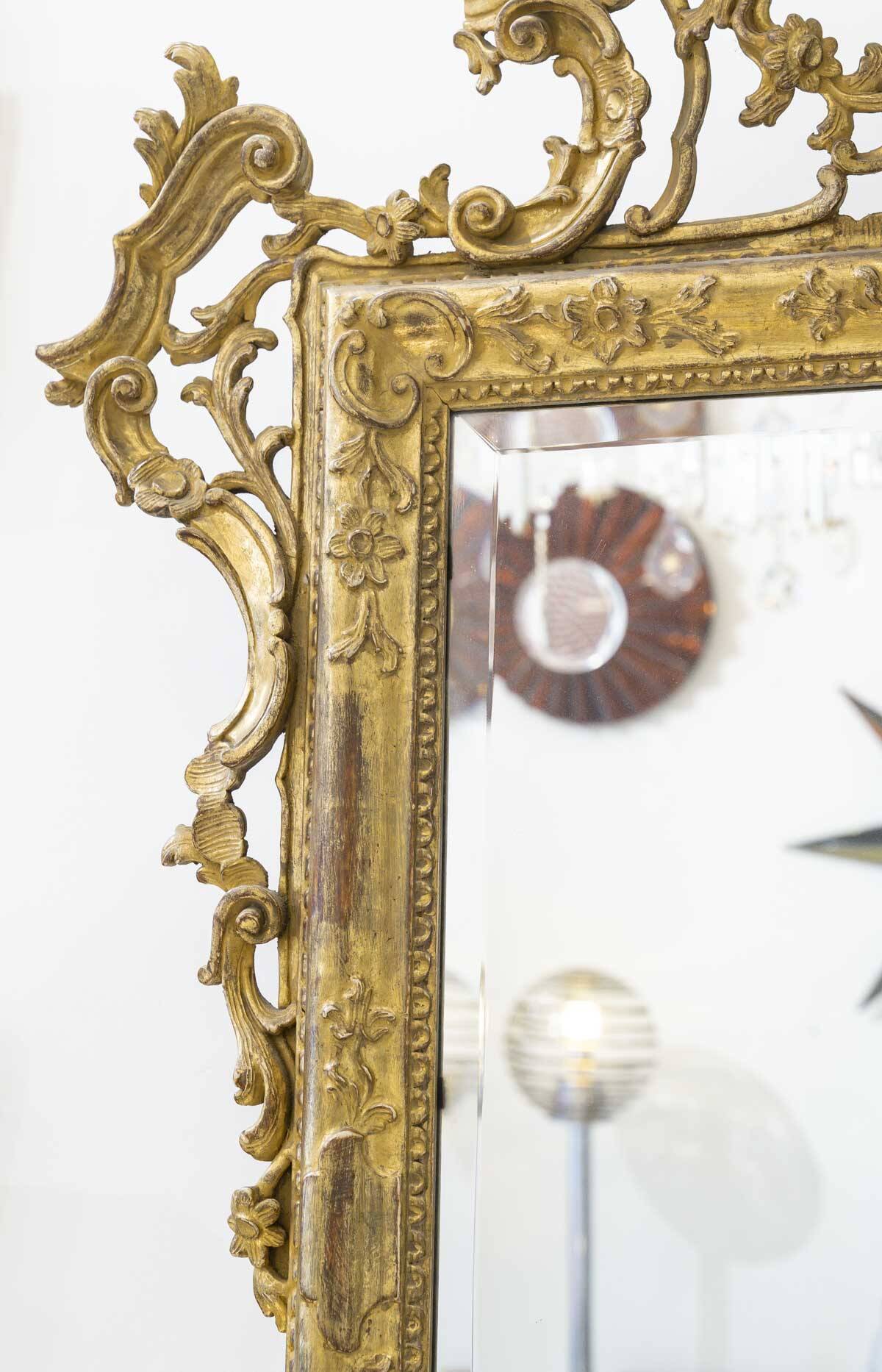 19th century Italian mirror in carved gilded wood