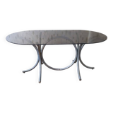 Large oval table from the 70s in smoked glass with chrome legs