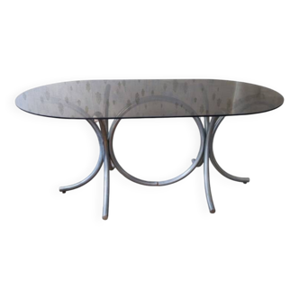 Large oval table from the 70s in smoked glass with chrome legs