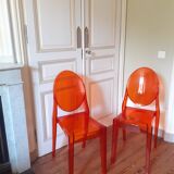 2 Chaises orange Victoria Ghost design Starck éditées par Kartell