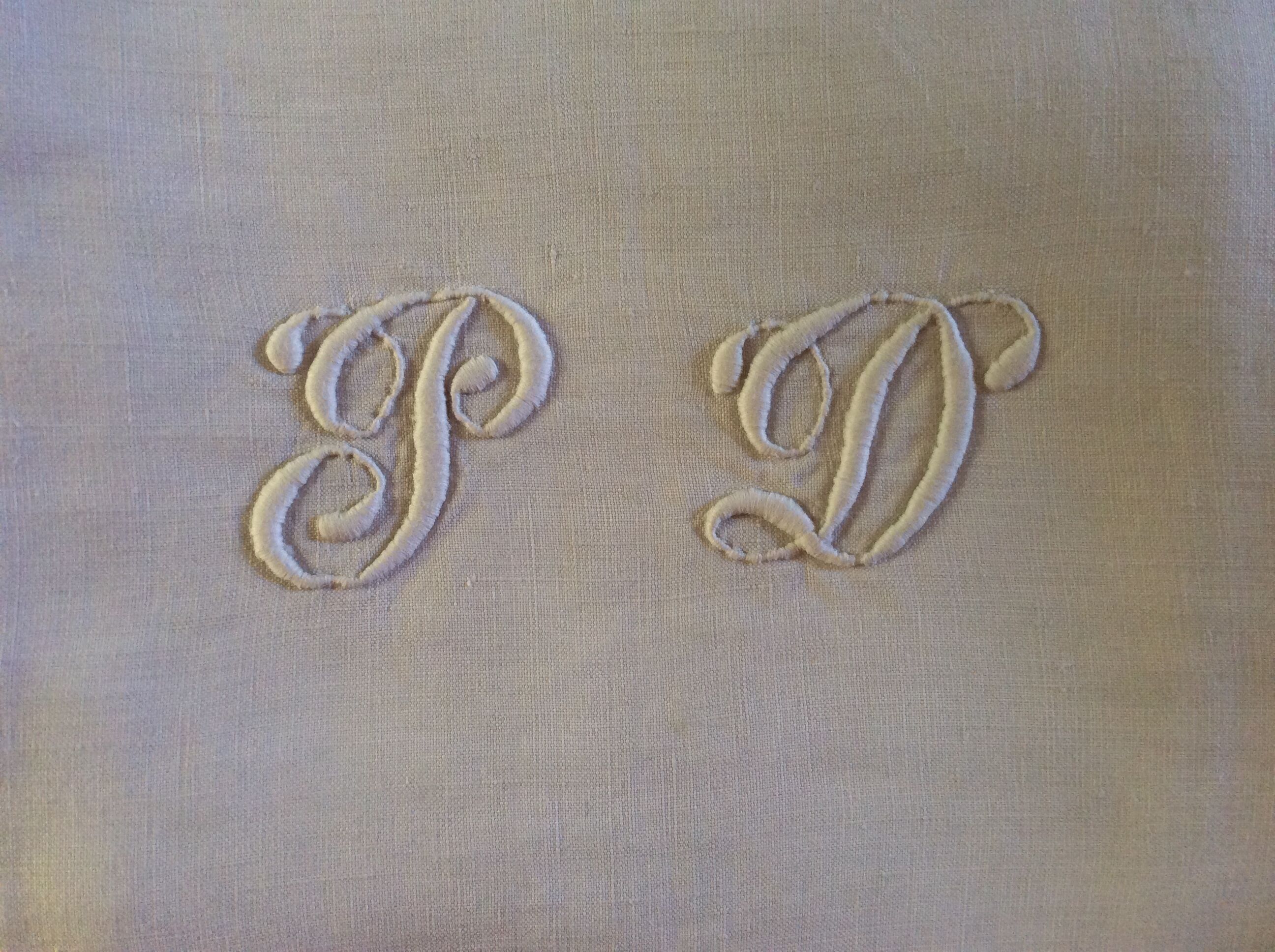 Suite of 22 monogrammed canvas napkins
