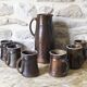 Pitcher service and 6 ceramic cups
