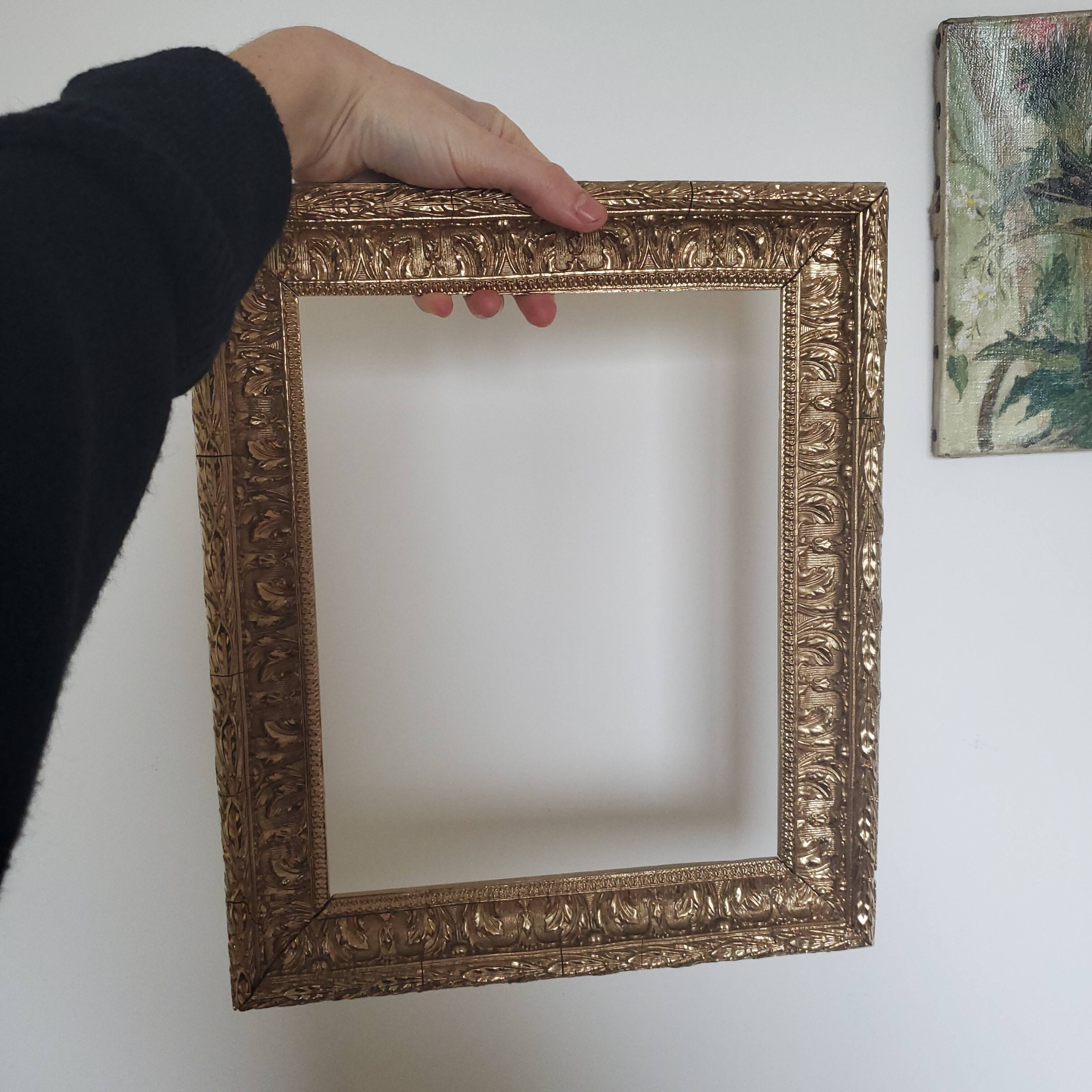 Old gilded carved wooden frame
