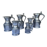 6 pewter pitchers