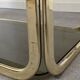 Hollywood Regency gilt metal and smoked glass shelf, Italy circa 1970