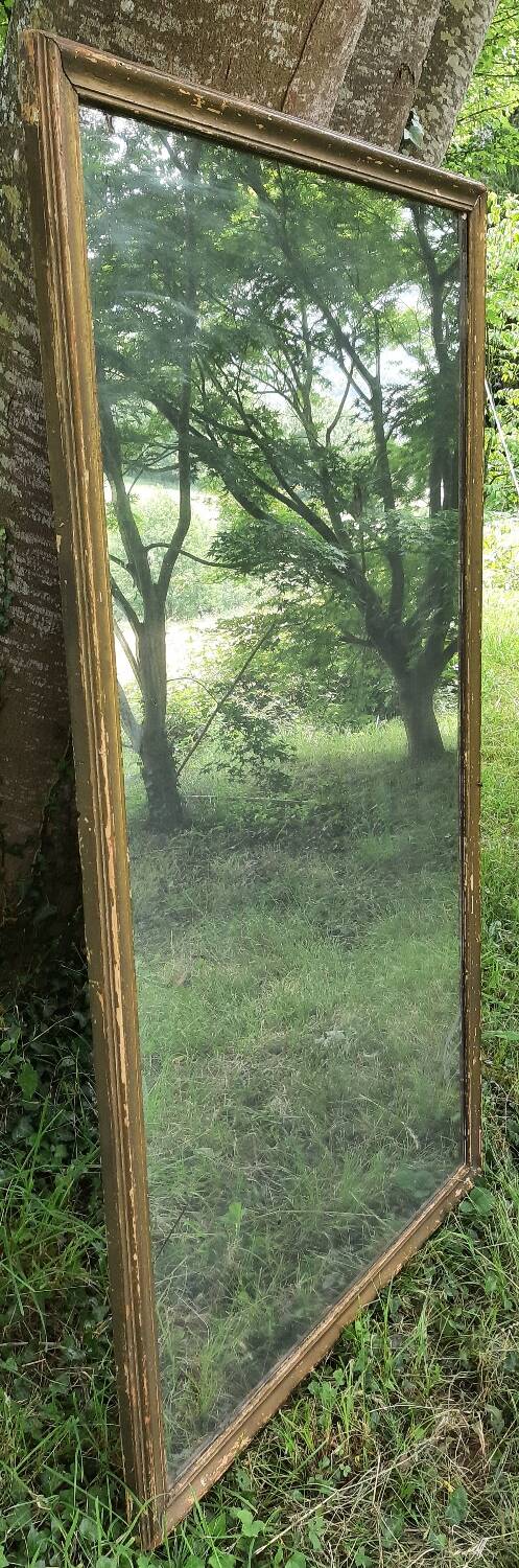 Antique mercury mirror. (Fireplace mirror)