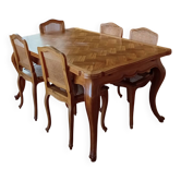 Table à manger bois mouluré et ses 5 chaises en cannage de rotin