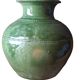 Ancient vase in glazed terracotta with green glaze.