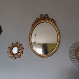 Louis XVI mirror in gold resin decorated with knots 44x62cm