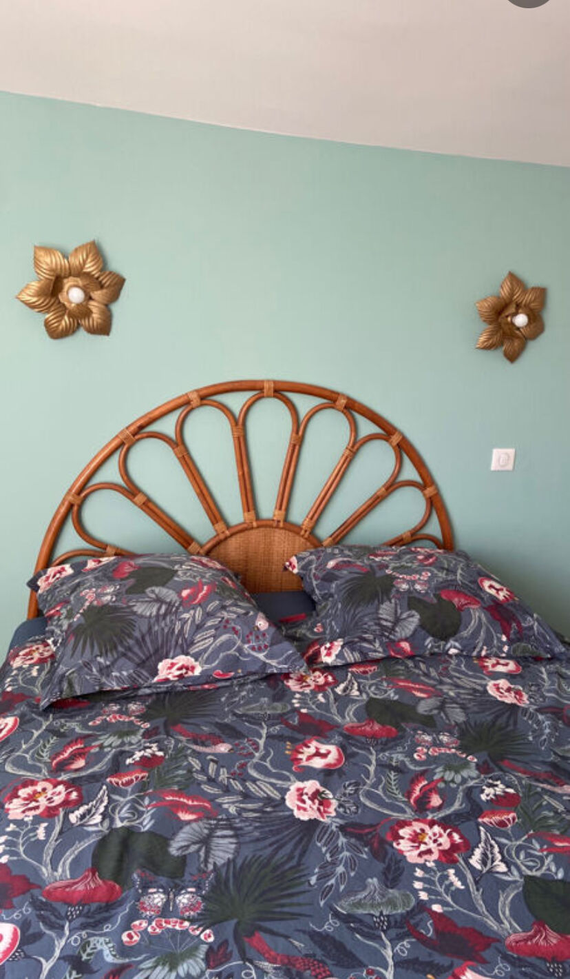 Vintage 1970s rattan and cane headboard for a double bed.