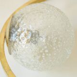 Mid century modernist pendant light in brass and textured glass ball