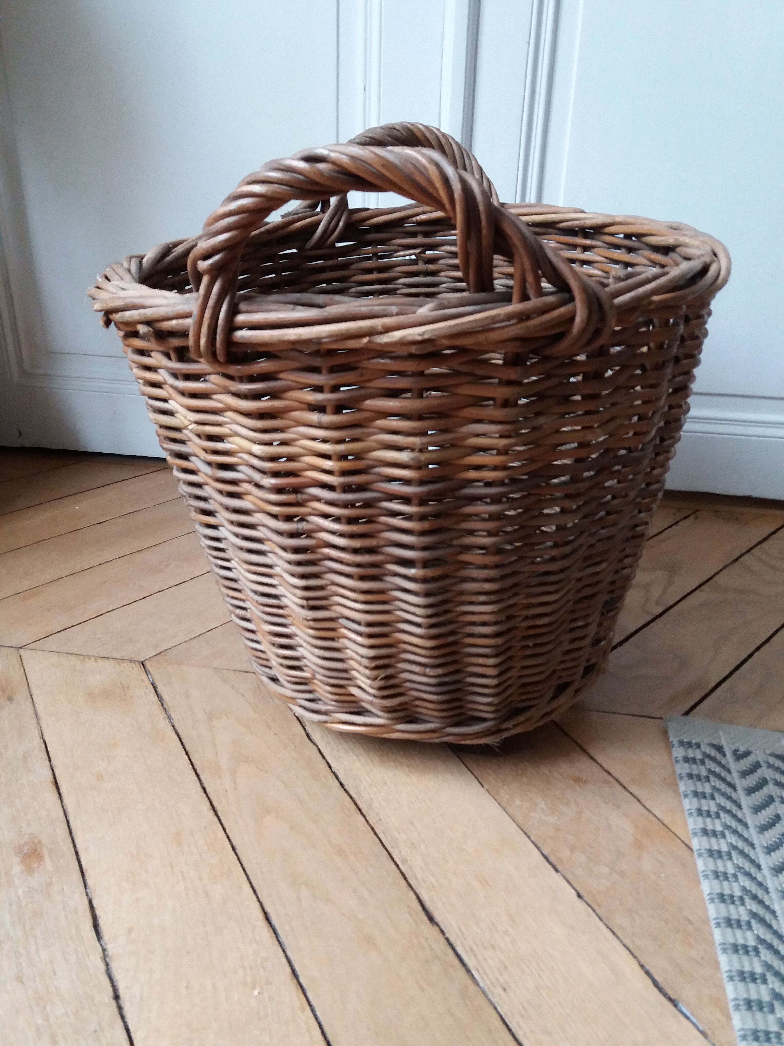 Antique wicker laundry basket
