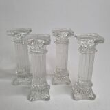 Set of four glass covered doors in the shape of Corinthian columns