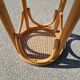 High bar stool in curved wood and cane