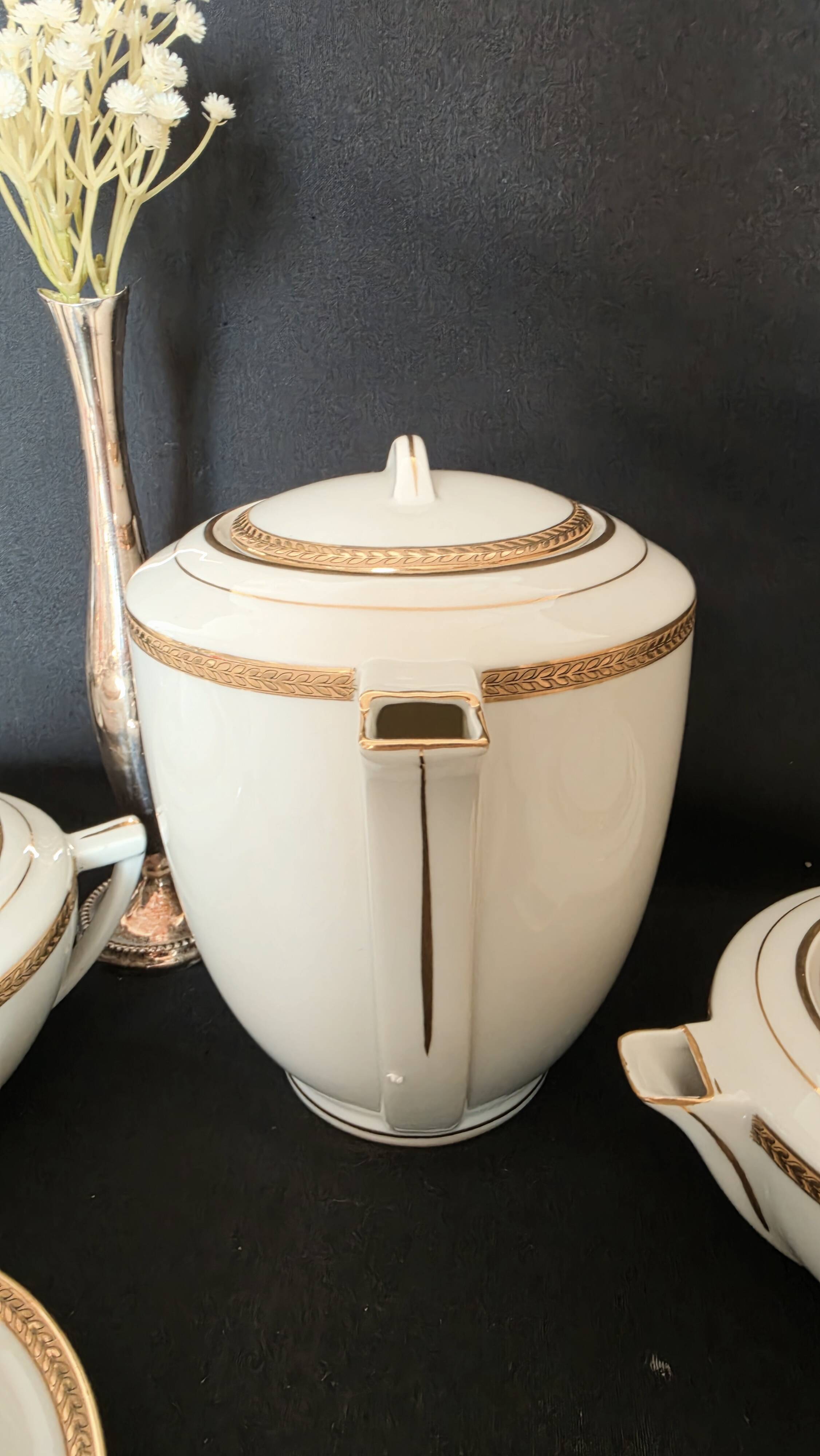 Coffee or tea service in Limoges porcelain and gold, France, Art style.