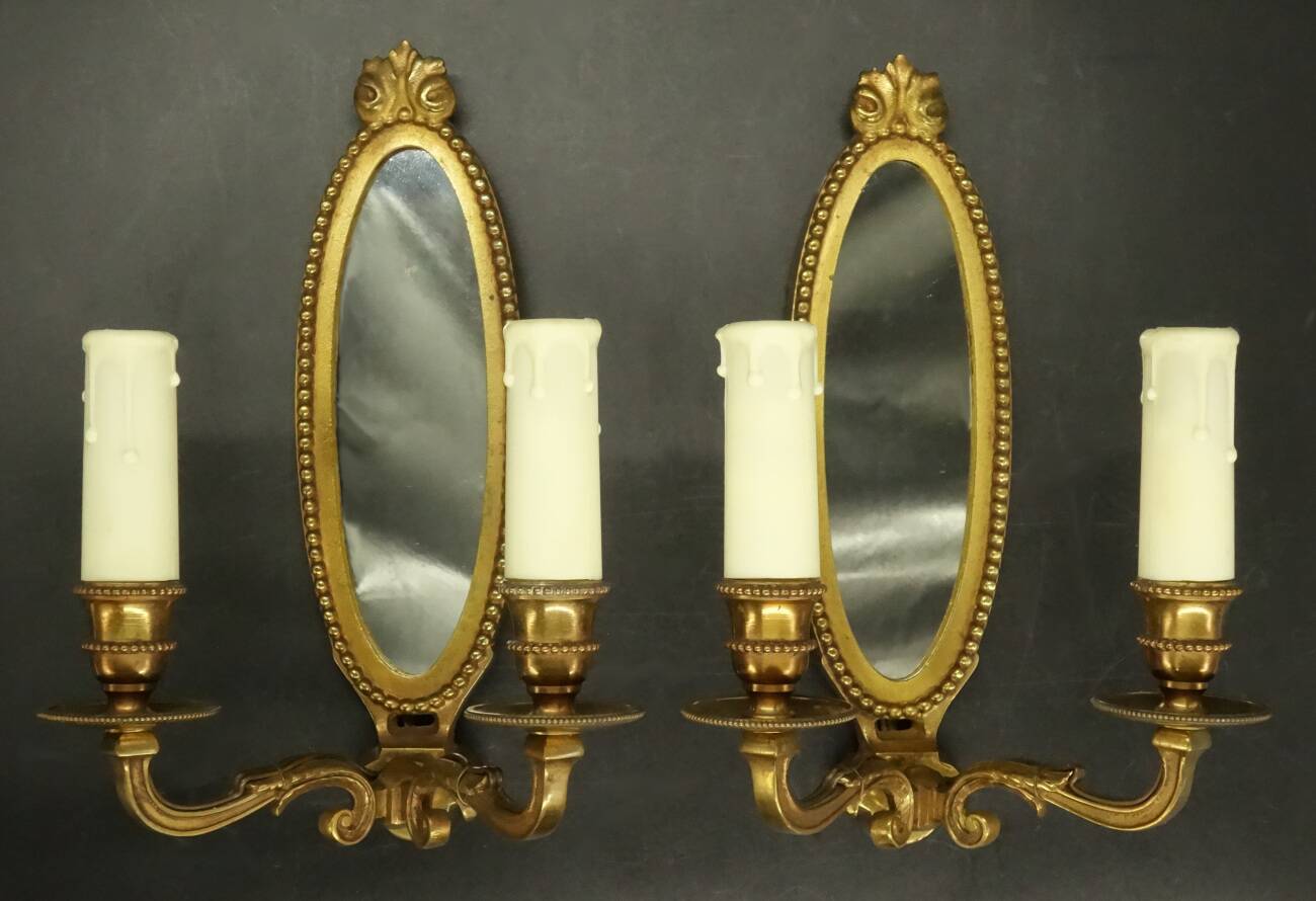 Paire d'appliques-miroirs style Louis XVI - bronze
