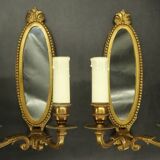 Paire d'appliques-miroirs style Louis XVI - bronze