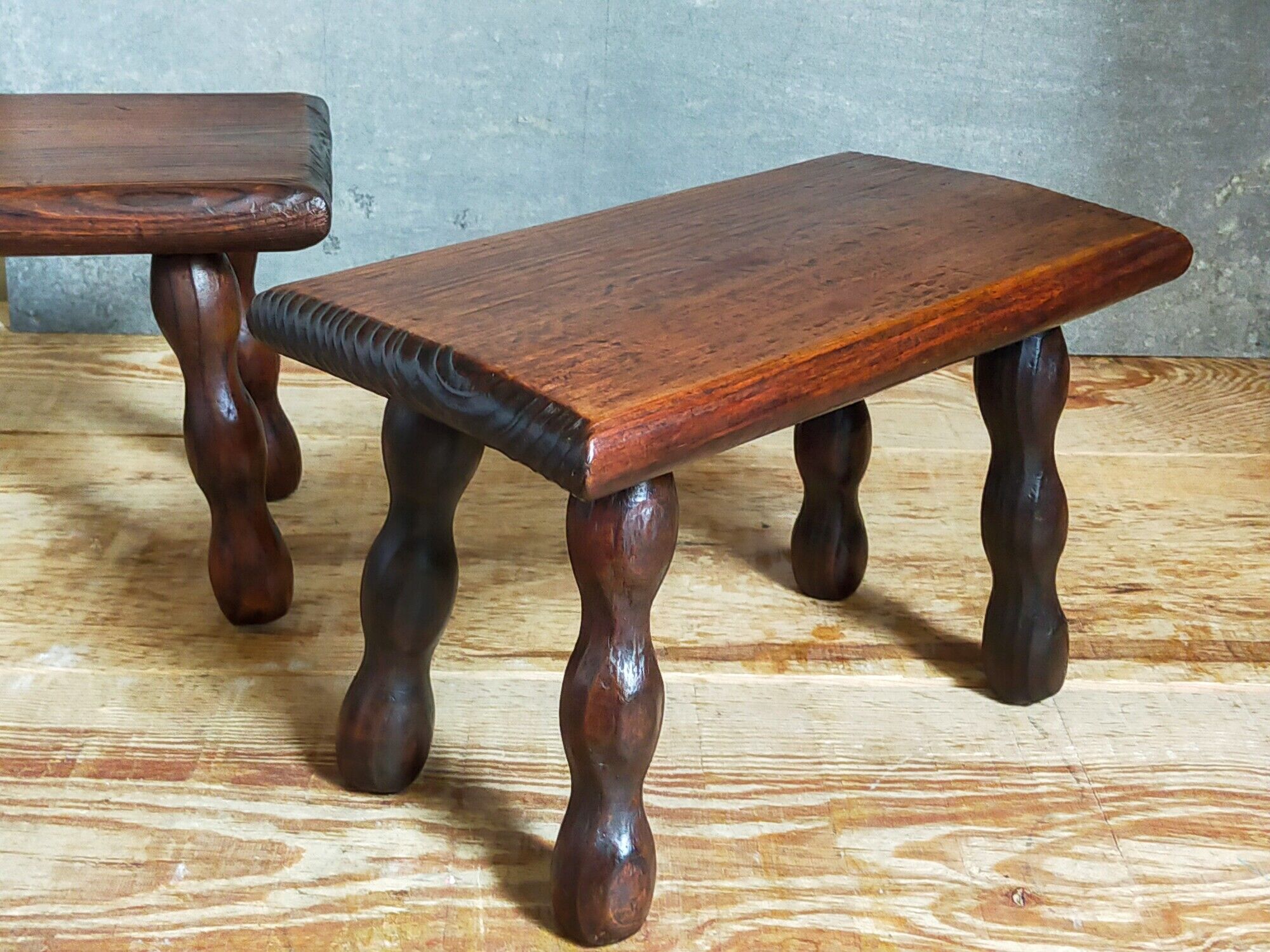 Pair of vintage solid turned wood footstools