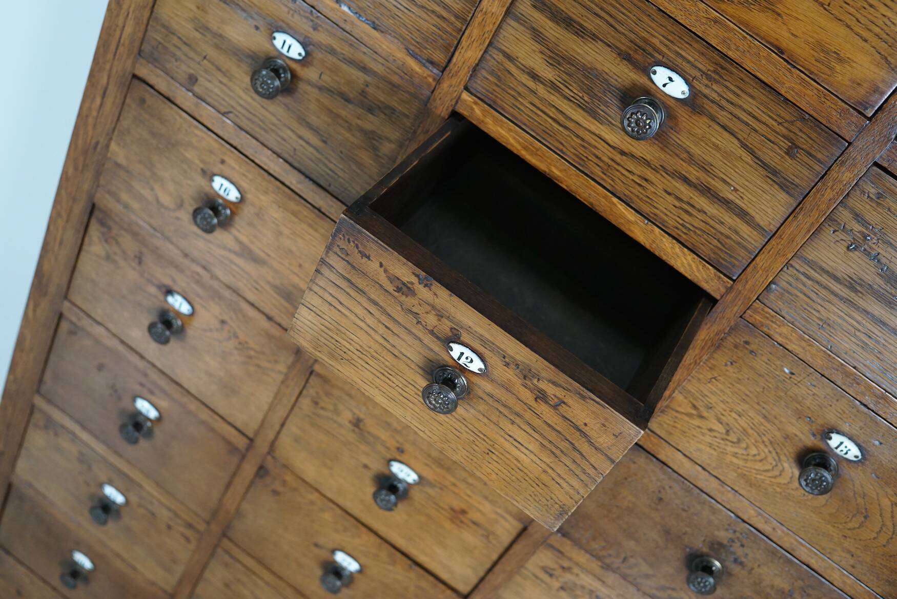 Large dutch oak apothecary cabinet / barber cabinet with enamel shields, 1900s