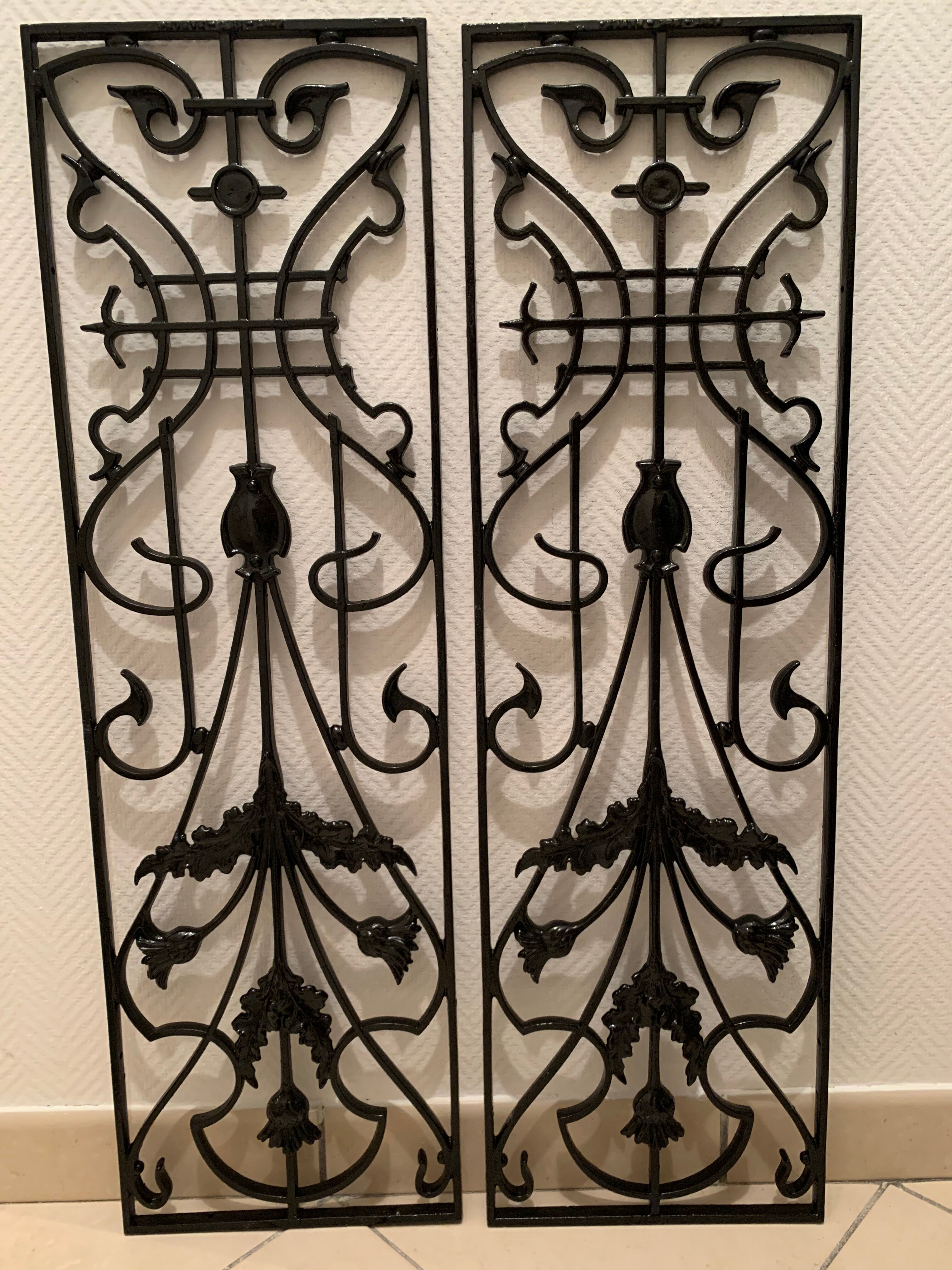 2 Art Nouveau ironwork grids decorated with inopuly or blueberry decoration