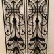 2 Art Nouveau ironwork grids decorated with inopuly or blueberry decoration